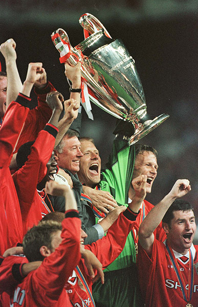 Fergie by Tom Jenkins: Peter Schmeichel and Alex Ferguson lift the Champions League trophy