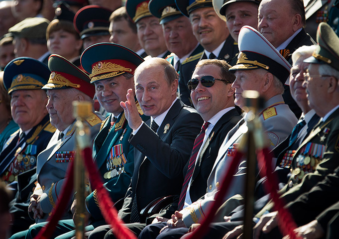 Victory day celebrations: Vladimir Putin, Dmitry Medvedev, Sergei Shoigu watch the Victory Day Parade