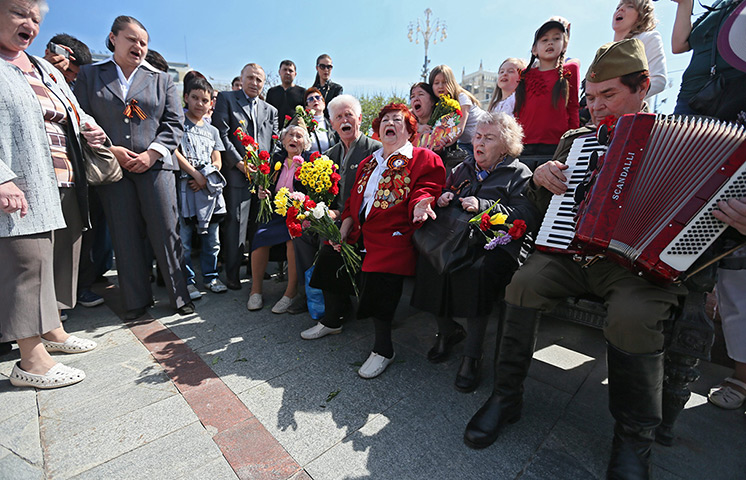 Victory day celebrations: Russian WWII veterans sing  war songs as they celebrate Victory Day in the 