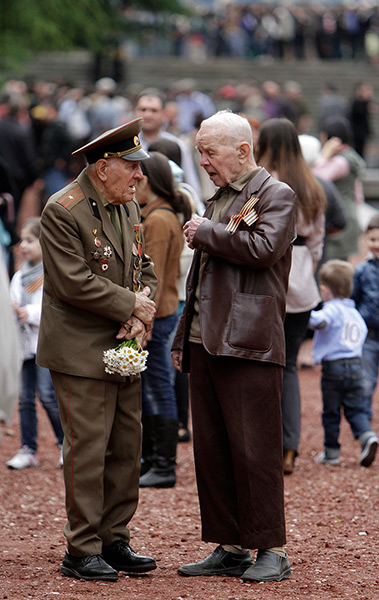 Victory day celebrations: Veterans chat during a Victory Day celebration in Tbilisi, Georgia