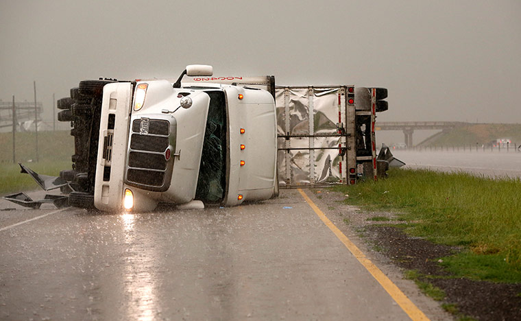 Oklahoma: An overturned truck blocks a road off Interstate 40 in El Reno