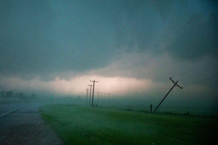 20 Photos: high winds snap an electricity pylon on Highway 81, south of El Reno, Oklahoma