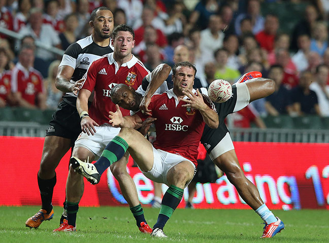 lions: Jamie Roberts loses a high ball because of the challenge of Joe Rokocoko