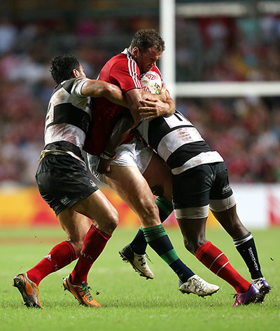 LIONS 2: Jamie Roberts is stopped in his tracks