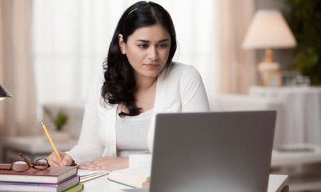 woman studying on laptop