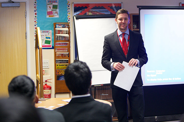 Community Challenge: A representative from Zurich gives a presentation