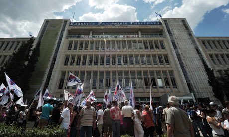 People gather outside the Greece's publi