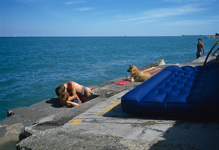 Big Picture - Doug Ischar: men sunbathing on urban beach