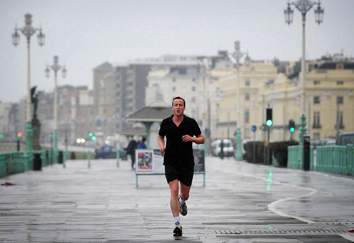 Stefan Rousseau: Conservative Party leader David Cameron takes a run