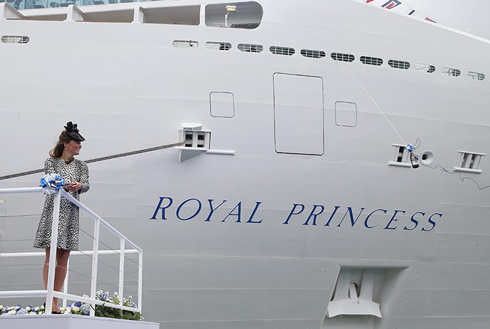 Duchess of Cambridge: She breaks the traditional bottle of Champagne against the ship