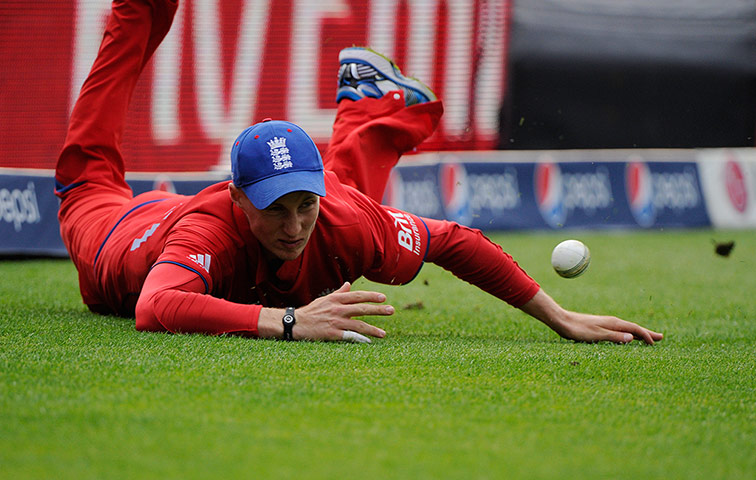 Champions Trophy 2: Joe Root flings himself across the skiddy Oval turf to stop a boundary 