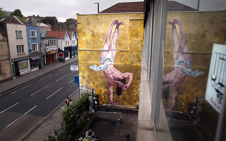 20 Photos: Controversial Mural Of Breakdancing Jesus Is Unveiled