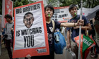 Protesters blow whistles during a protest in support of Edward Snowden in Hong Kong
