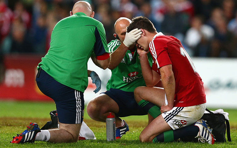 Lions Tour Match: Jonathan Sexton of the Lions receives attention from the trainer