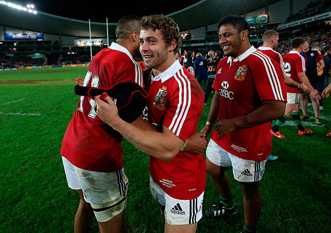 Lions Tour Match: Lions' Simon Zebo, Leigh Halfpenny and Mako Vunipola celebrate the win