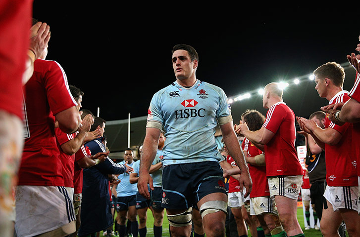 Lions Tour Match: David Dennis and team mates walk off the field after a great match