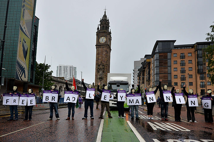 G8: Protesters wearing Guy Fawkes masks in Belfast