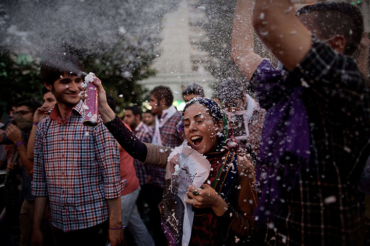 the weekend in pictures:  Jubilant supporters of Hassan Rouhani celebrate his victory