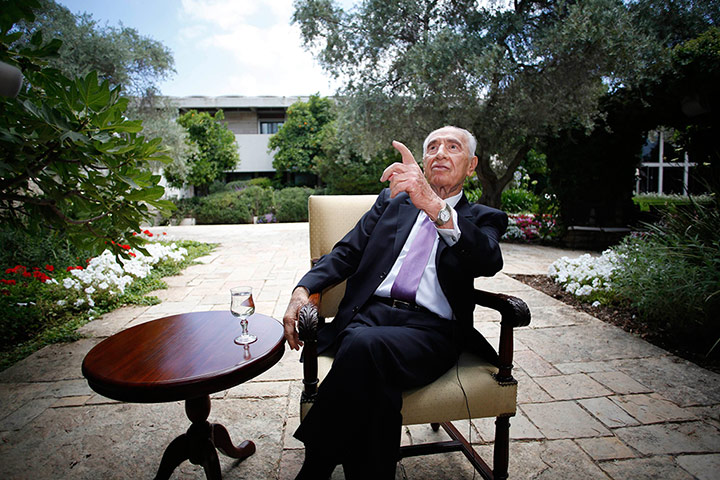 Peres's party: Israel's President Shimon Peres gestures