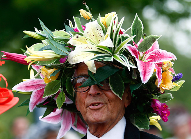 Ascot day one: A man wears a hat made of flowers