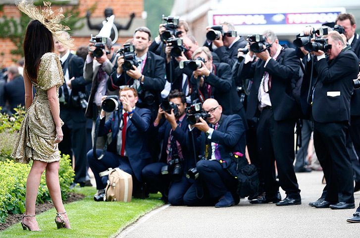 Ascot day one: Melanie Mar poses for suited photographers