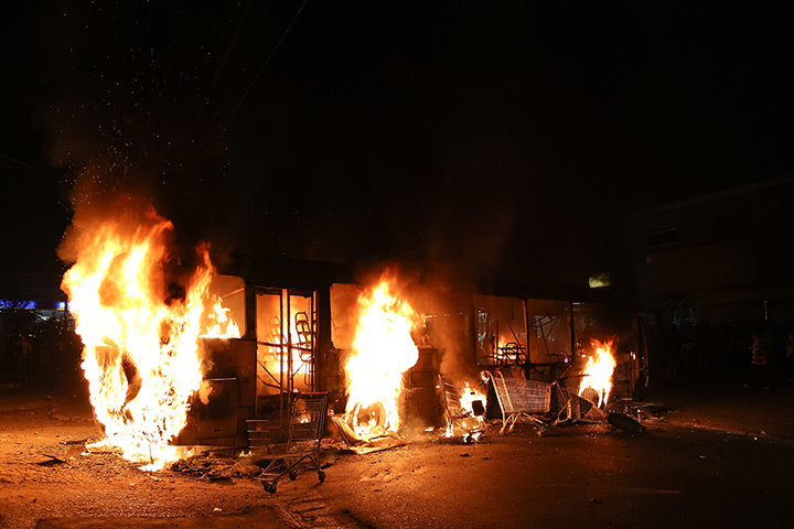 Brazil protests continue: A bus is set a blaze by a group of vandals