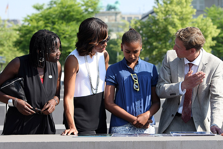 Malia and Sasha Obama: (L-R) Auma Obama,  Barack Obama's half sister, Michelle Obama, her daughter