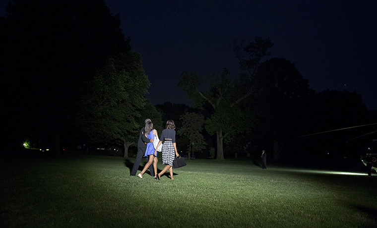 Malia and Sasha Obama: Barack Obama, Michelle Obama and their daughter Malia walk to Mari