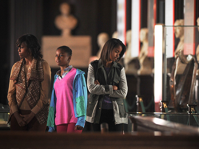 Malia and Sasha Obama: Michelle Obama, Sasha and Malia tour the Old Library Building at Trinity Co