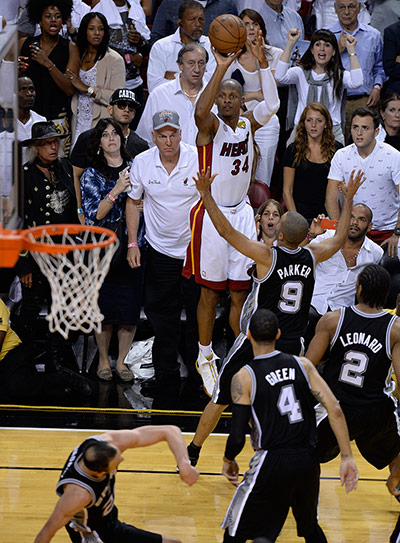 NBA Championship: Miami Heat shooting guard Ray Allen shoots a three-point jumper to tie