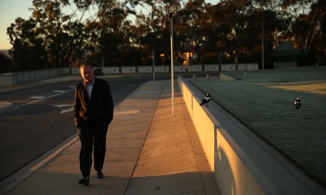 Senator Barnaby Joyce takes a morning constitutional around Parliament House in Canberra. The Global Mail.