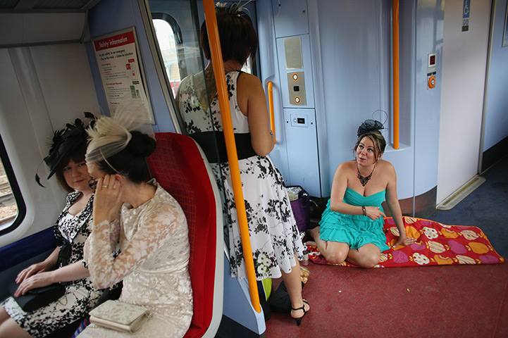 Ladies day at Ascot: Racegoers travel by train from Waterloo station