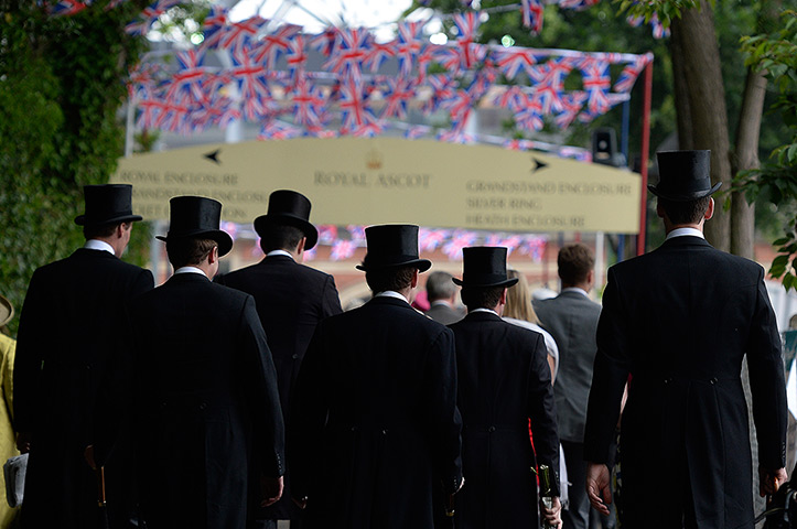Ladies day at Ascot: Top hats making thier way to the course before racing in Royal Ascot