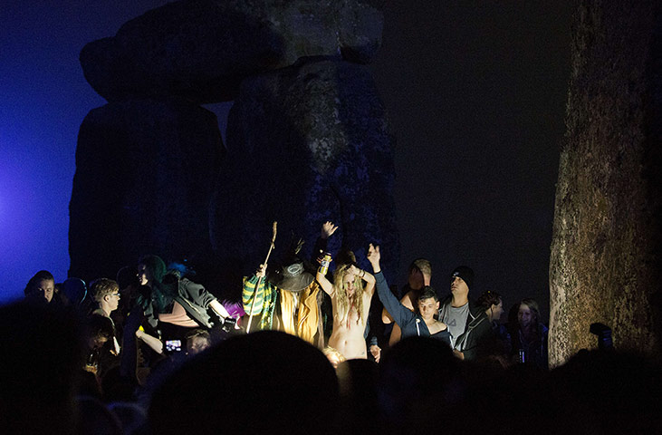 2013 summer solstice: Revelllers gather before dawn to celebra