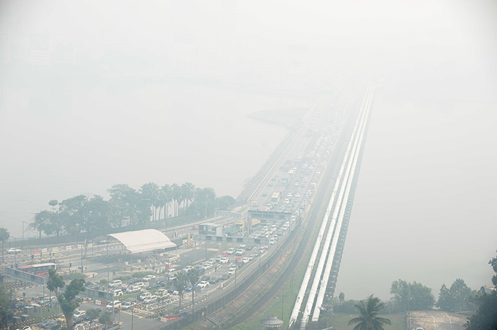 Singapore smog: The causeway from Singapore to Johor Bahru is obscured by haze