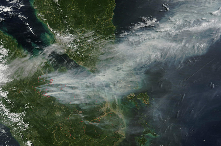 Singapore smog: A satellite view shows smoke from forest fires in Sumatra blown eastwards t