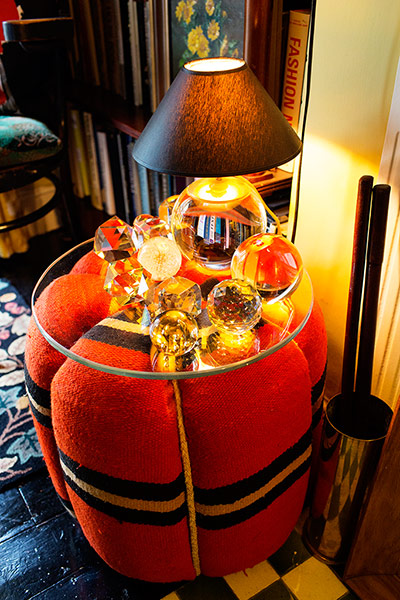 The Selby: A pouffe used to show off paperweights