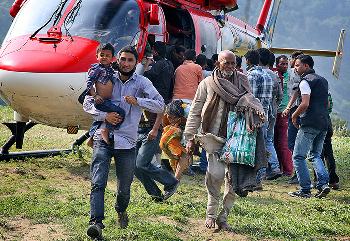 India Food: Indian pilgrims leave the helicopter