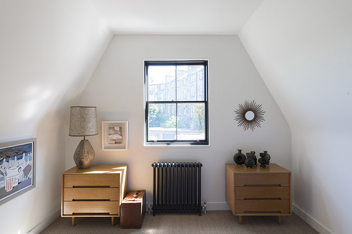 homes - edinburgh house: bedroom with wooden mid-century furniture and white walls