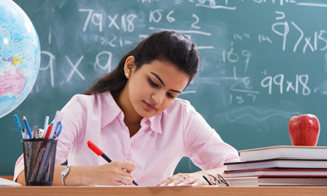 A teacher working at her desk