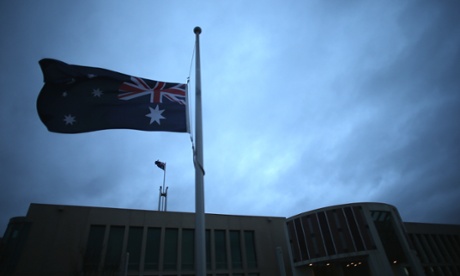 The flags around Parliament House Canberra fly at half mast this morning in honour of the memorial service for former first lady Hazel Hawke. The Global Mail.