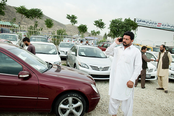 Kabul's new rich: A customer at a Kabul car dealer's.