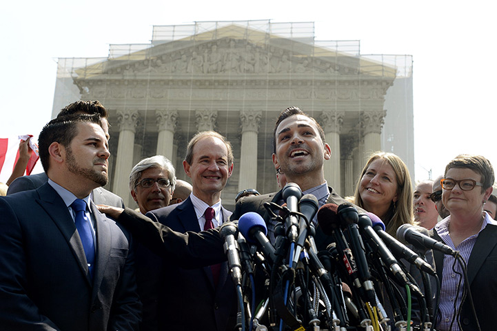 Gay marriage : Plaintiff Paul Katami (C) delivers remarks beside plaintiff Jeffrey Zarrill