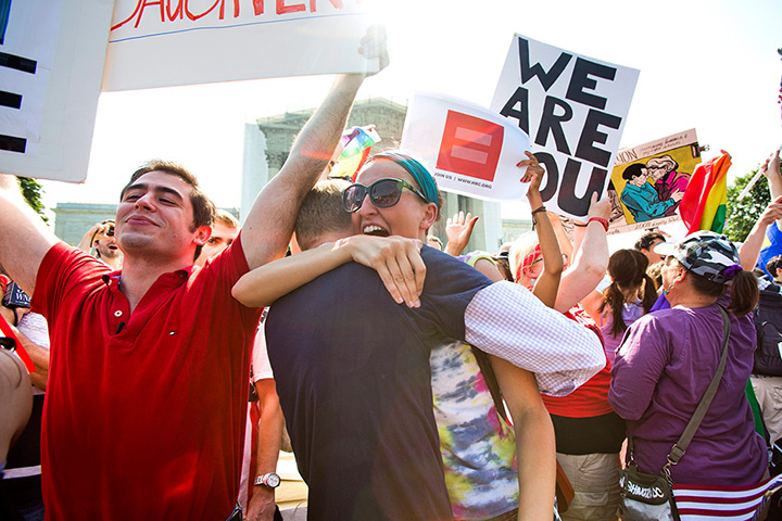 Gay marriage : Gay rights supporters react to the news outside the Supreme Court in Washin