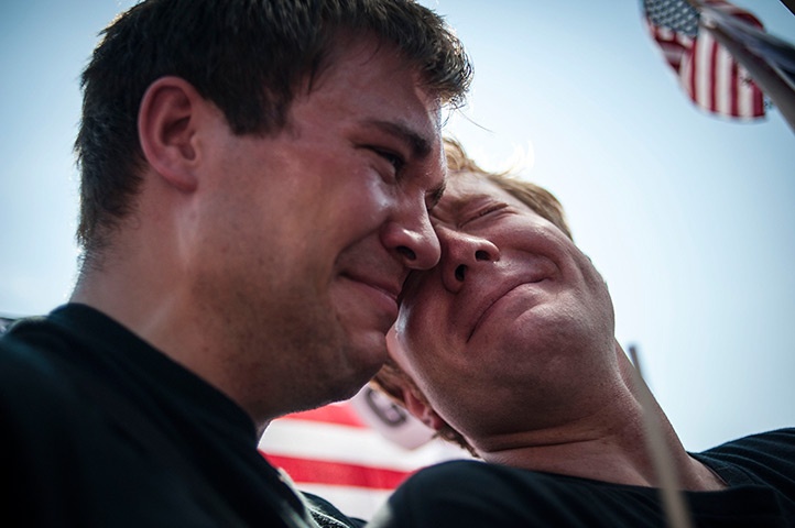 Gay marriage : Michael Knaapen and his husband John Becker, both of Wisconsin, react at th