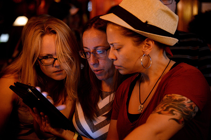 Gay marriage : Patrons of the Stonewall Inn gather to hear the Supreme Court rulings in Ne