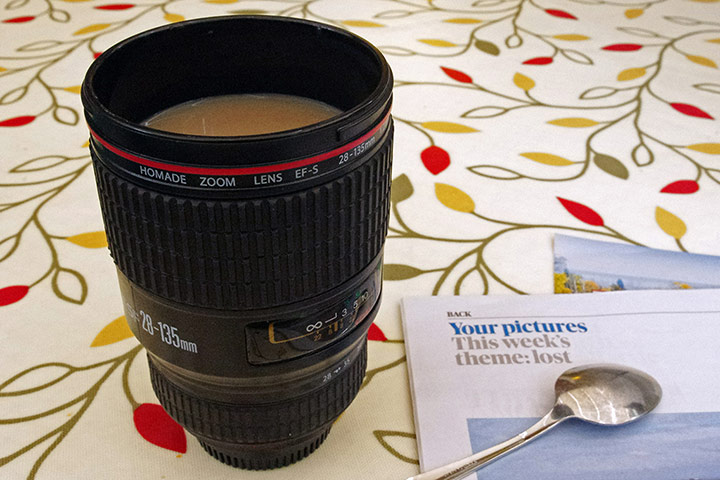 Your Pictures - Zoom: zoom lens coffee mug on table with magazine