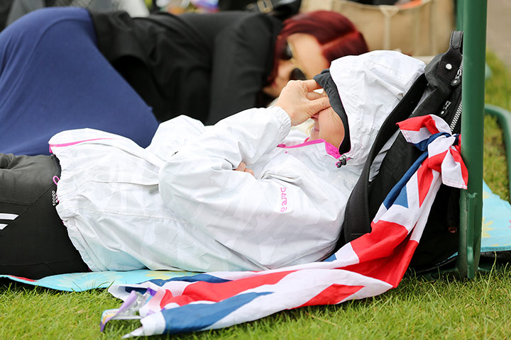 Sleepers at Wimbledon: A woman with sore eyes
