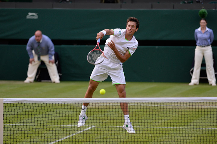 Tom's Federer: Sergiy Stakhovsky in his match against Roger Federer 