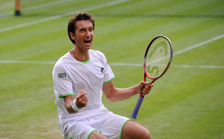 Tom's Federer: Sergiy Stakhovsky celebrates victory on matchpoint 